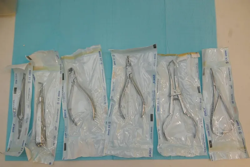 Sterilised instruments in sealed pouches